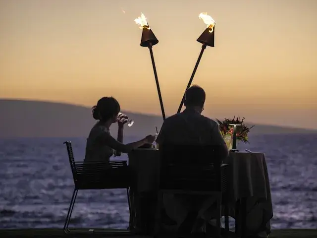 happy married couple enjoying a romantic dinner